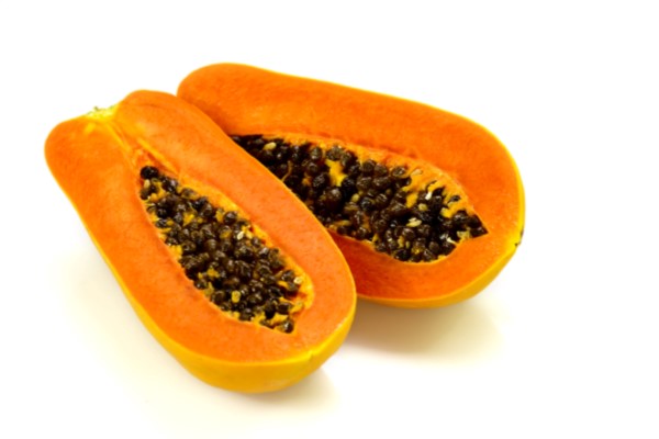 “Papaya fruit and enzymes supporting digestion and reducing bloating”