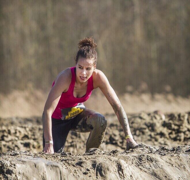 Person performing a squat during a strength training workout