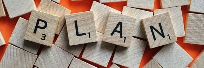 wooden tiles to demonstrate a goal orientated workout plan