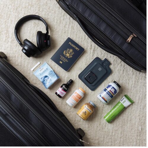 “Shelf-stable probiotic supplements packed in carry-on bag for air travel”