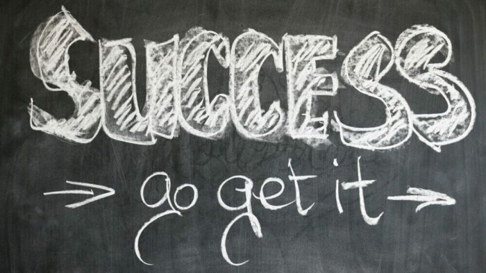 Black Board with wring in chalk. Success Go Get It for visualizing success to stay motivated in the gym