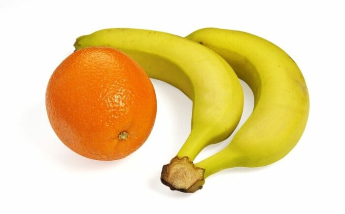 orange and bannanas representing a healthy nutritional diet to be consumed along with ab exercises for weight loss